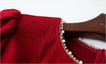 فستان نسائى أحمر راقى مزين بحبات اللؤلؤ الصغيرة