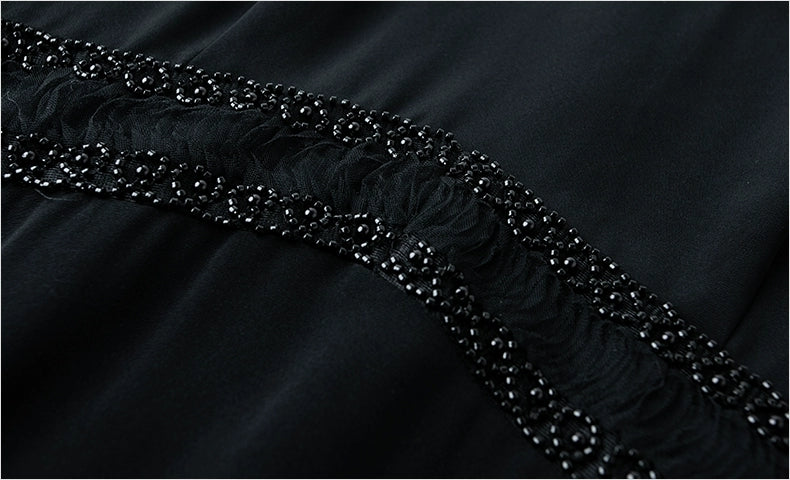 فستان أسود راقى بأكمام شفافة